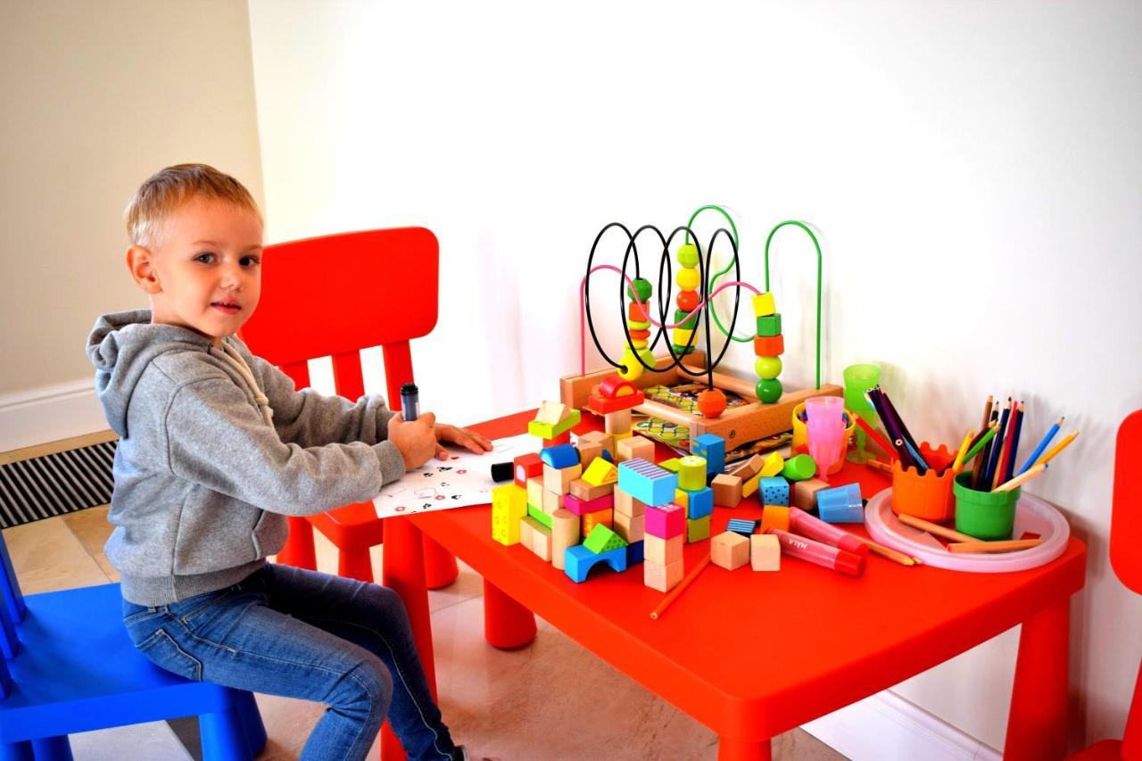 Boutique Odyseja & Spa Ciechocinek Luaran gambar Child playing with toys