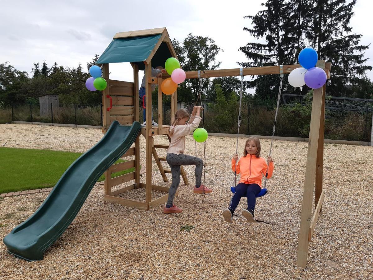 Boutique Odyseja & Spa Ciechocinek Luaran gambar Playground in the village